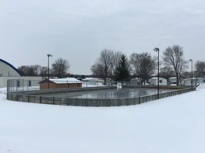 Outdoor ice rink and warming house